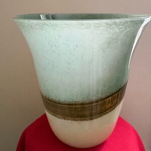 Party lite discontinued hurricane. Brand new. Brown and green accents.